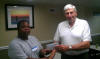 Kondlo receives cash from Frank Davis 8-4-2012 National.jpg (30779 bytes)